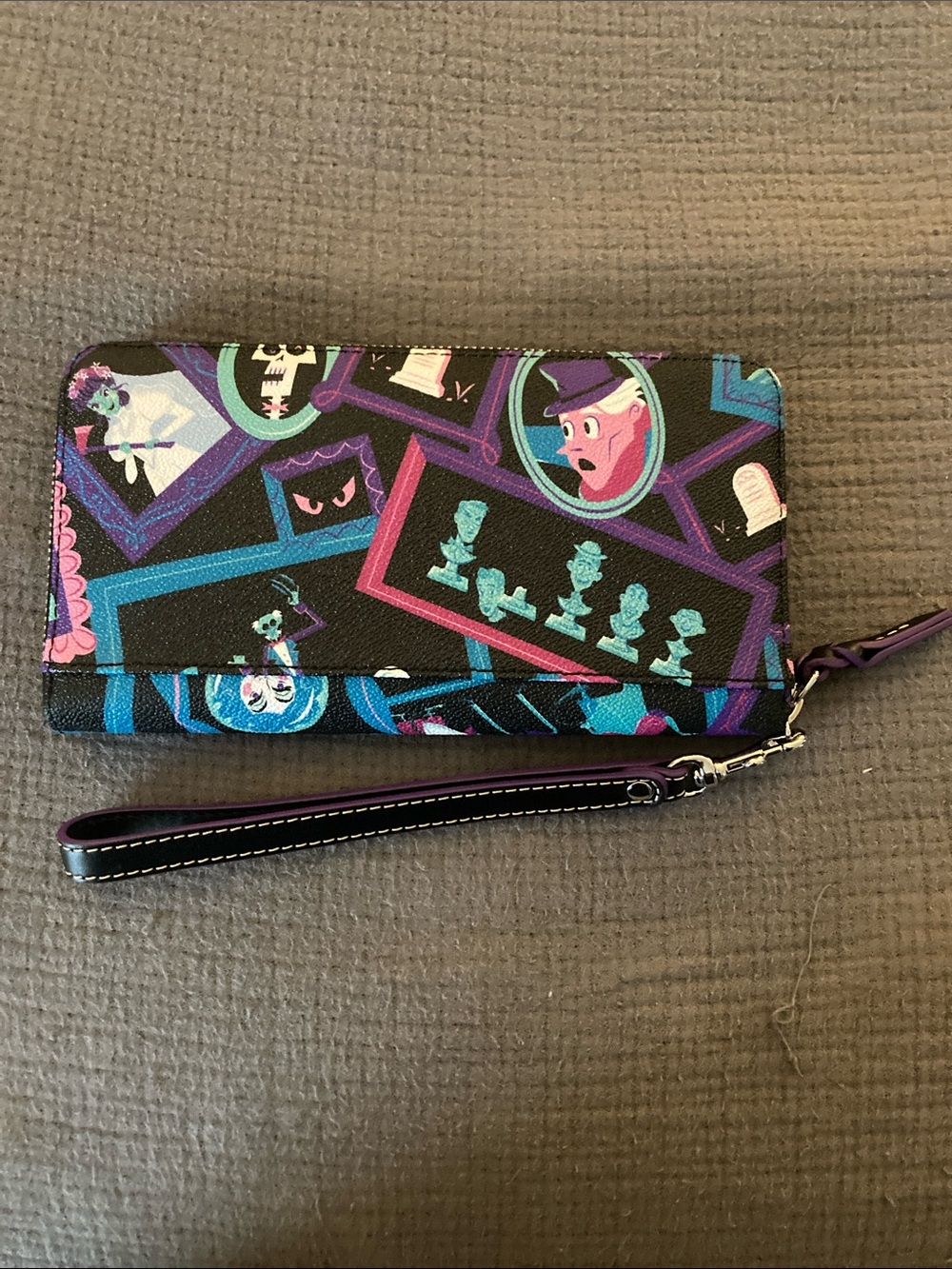 Dooney & Bourke Black Haunted Mansion Wristlet with Neon Frames - Picture 2 of 4